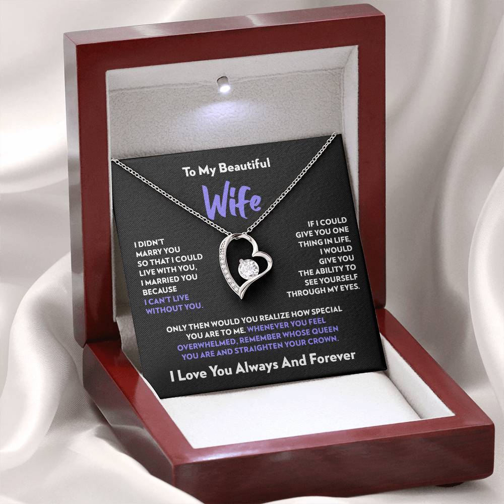 Mahogany style box with LED light holding the heart pendant necklace in 14k white gold finish and the "To My Beautiful Wife" message card from husband