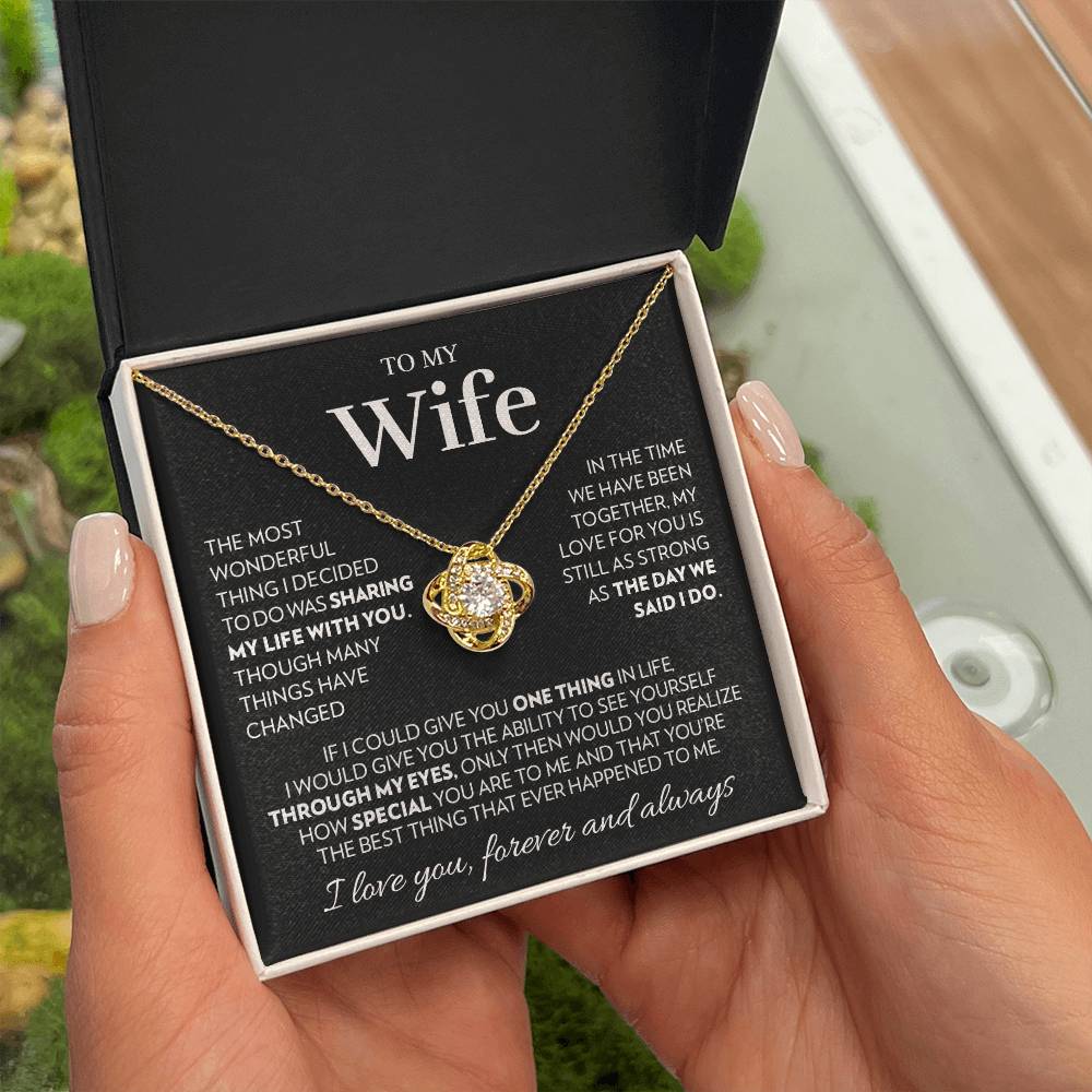 Love knot pendant necklace in 18k yellow gold finish with the "To My Wife" message card from husband, in the two tone soft touch box