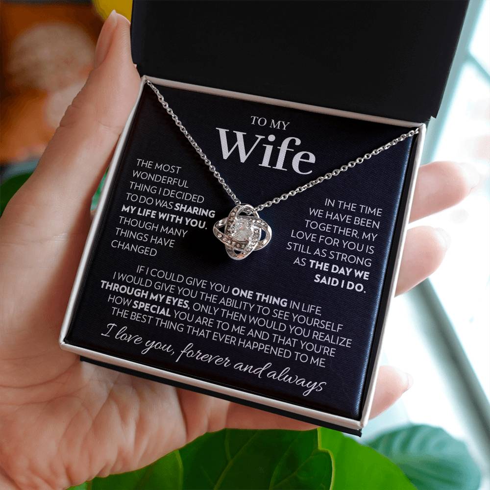 Love knot pendant necklace in 14k white gold finish with the "To My Wife" message card from husband, in the two tone soft touch box