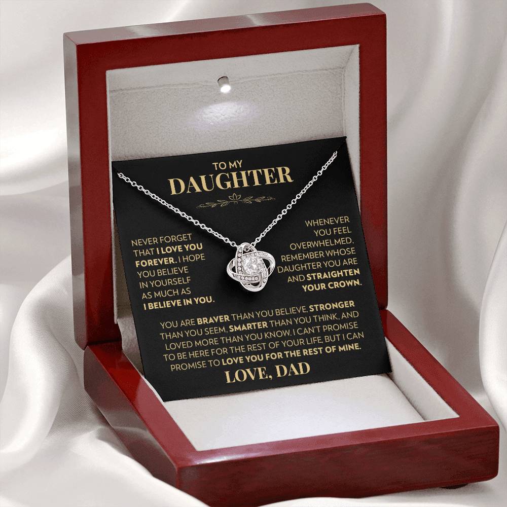 Mahogany style box with LED light holding the love knot pendant necklace in 14k white gold finish and the "To My Daughter" message card from Dad (Never Forget That I Love You)