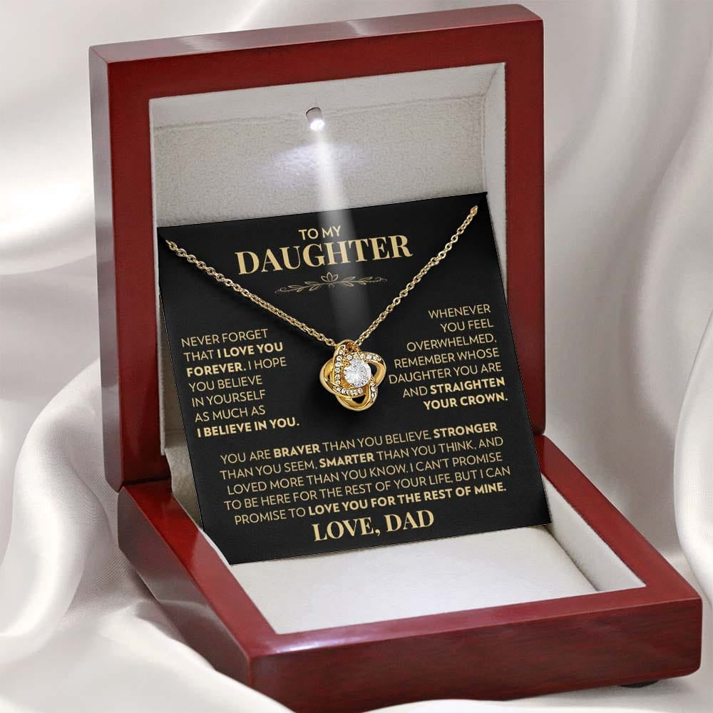 Mahogany style box with LED light holding the love knot pendant necklace in 18k yellow gold finish and the "To My Daughter" message card from Dad (Never Forget That I Love You)