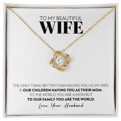 Love knot pendant necklace in 18k yellow gold finish on the "To My Beautiful Wife" message card from husband
