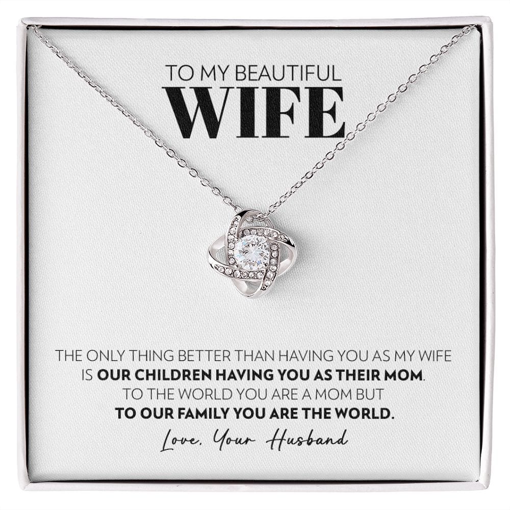 Love knot pendant necklace in 14k white gold finish on the "To My Beautiful Wife" message card from husband
