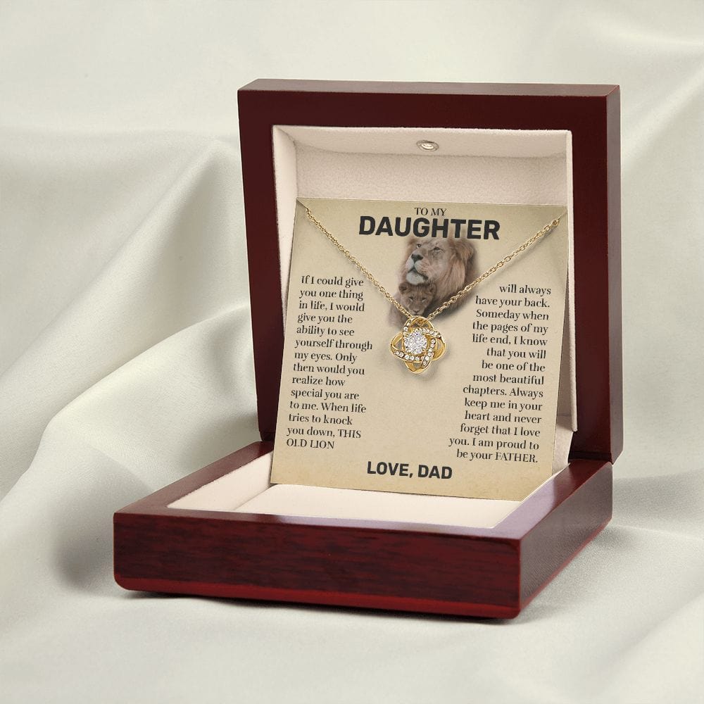 Mahogany style box with LED light holding the love knot pendant necklace in 18k yellow gold finish and the "To My Daughter" message card from Dad (This Old Lion)