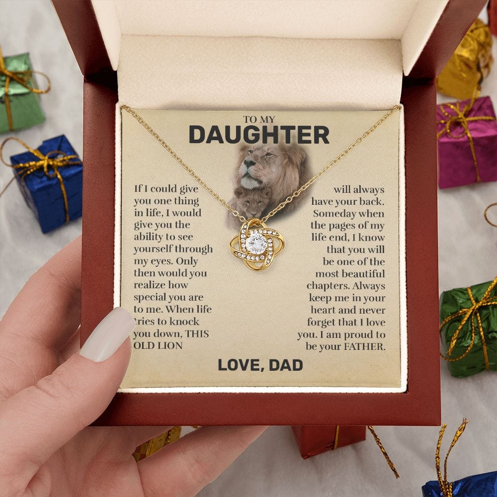Mahogany style box with LED light holding the love knot pendant necklace in 18k yellow gold finish and the "To My Daughter" message card from Dad (This Old Lion)