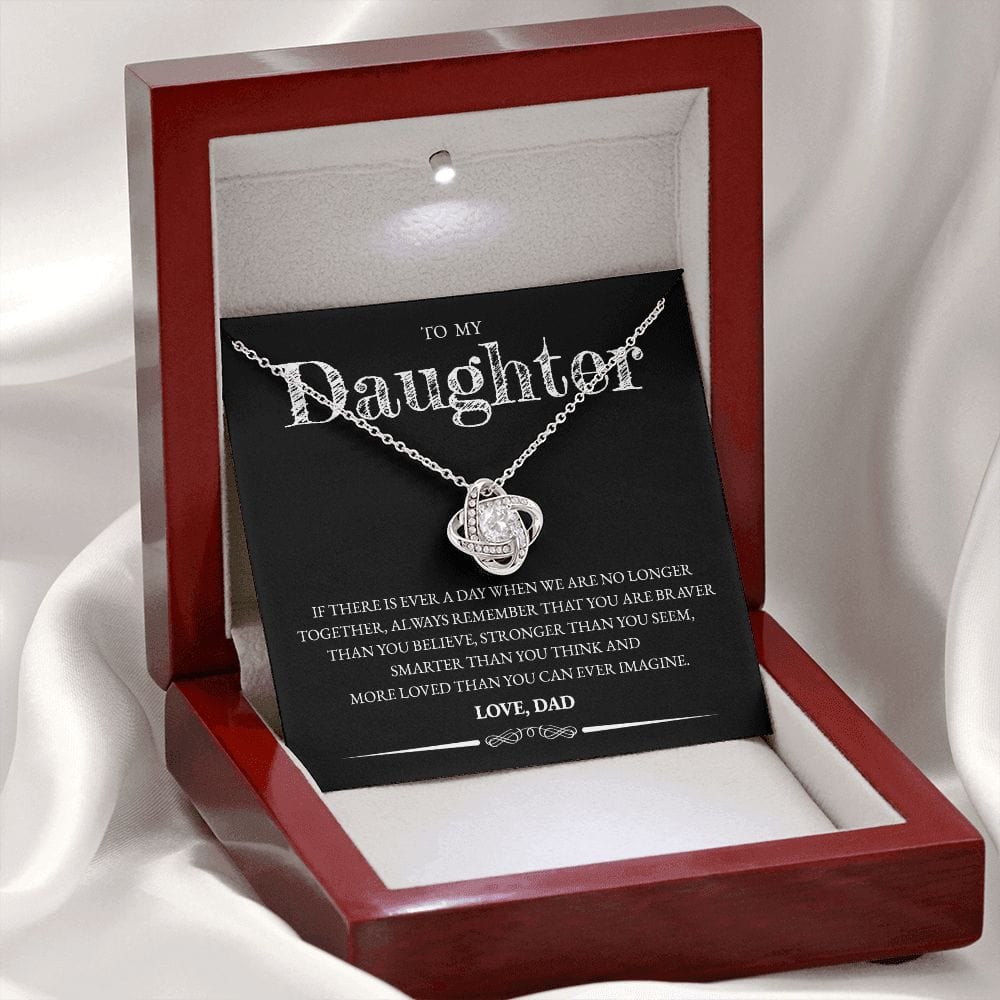 Mahogany style box with LED light holding the love knot pendant necklace in 14k white gold finish and the "To My Daughter" message card from Dad (If There Is Ever a Day)