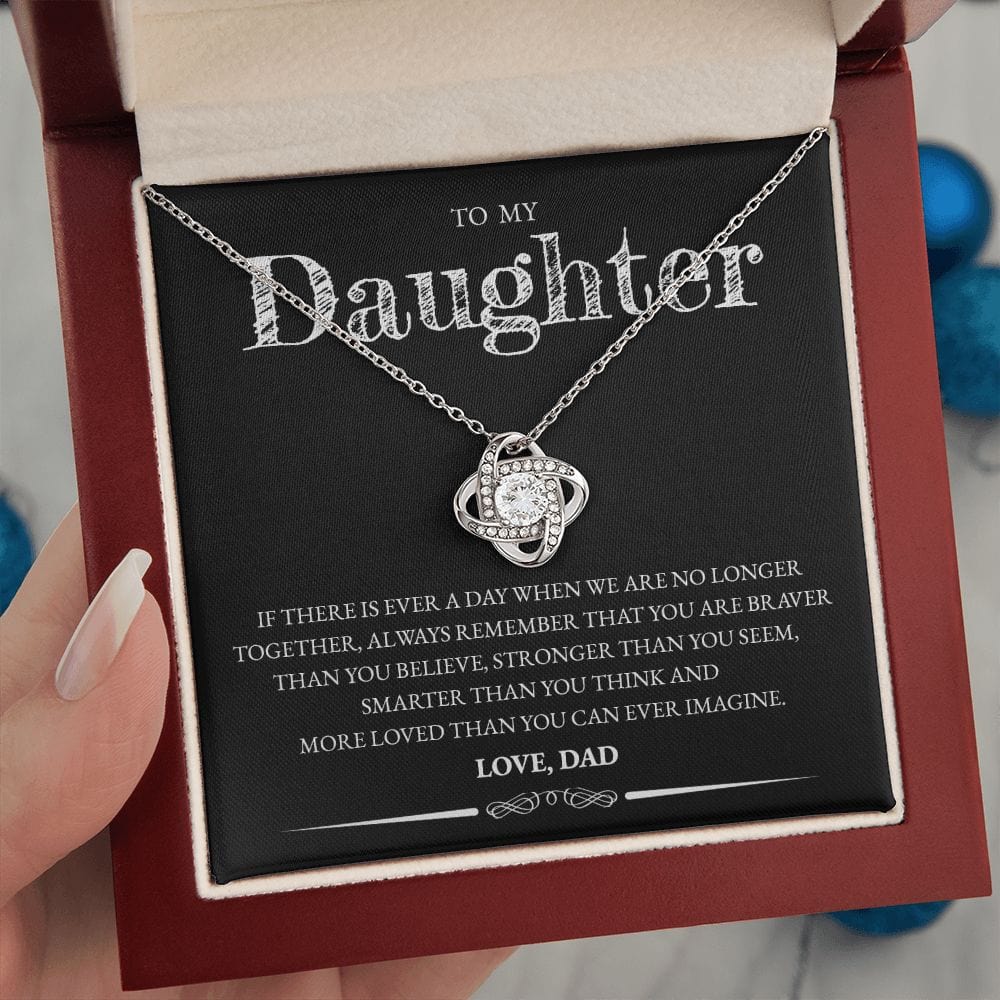 Mahogany style box with LED light holding the love knot pendant necklace in 14k white gold finish and the "To My Daughter" message card from Dad (If There Is Ever a Day)